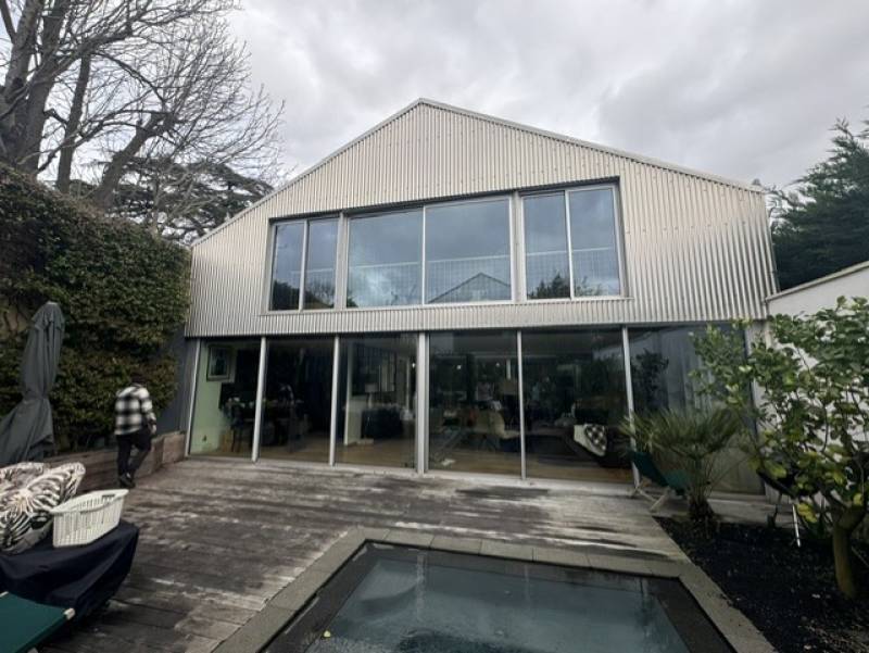 Remplacement de baie coulissante par un vitrage isolant pour confort été hivers dans une maison à Bordeaux