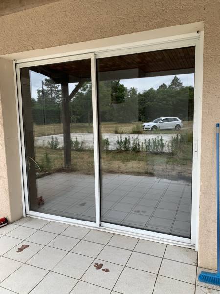 Remplacement d'un double vitrage sur baie vitrée coulissante à Mérignac près Bordeaux